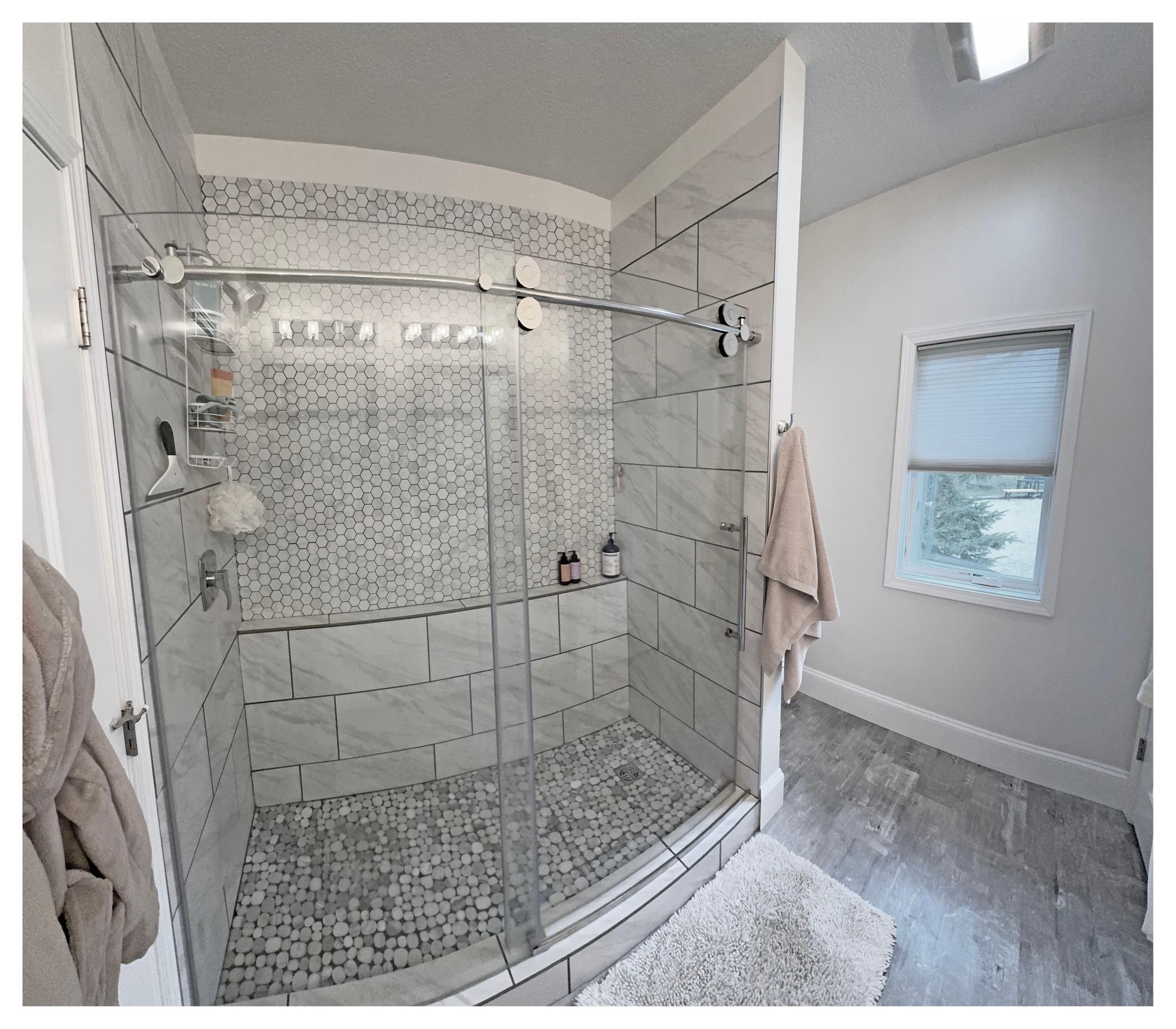 Tiled shower in Primary Bath.jpg