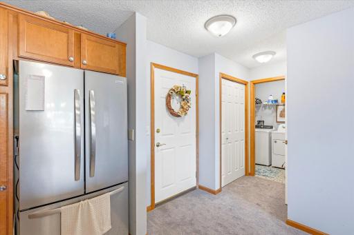 Entry door and laundry room view from Kitchen