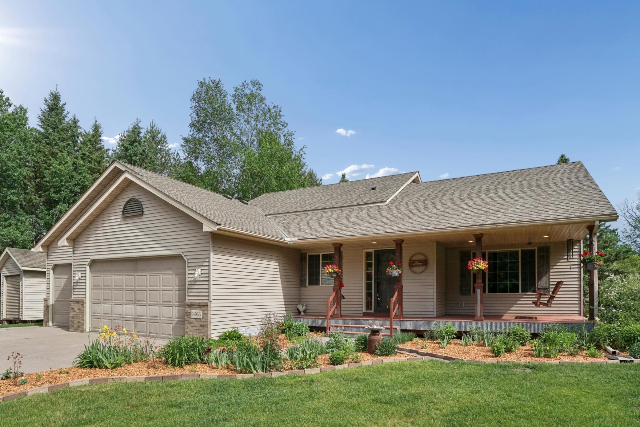 Steel siding, new roof in 2022, and a cozy covered front porch w/ recessed lighting and a swing!! This is the perfect place to enjoy your morning coffee or read a good book!
