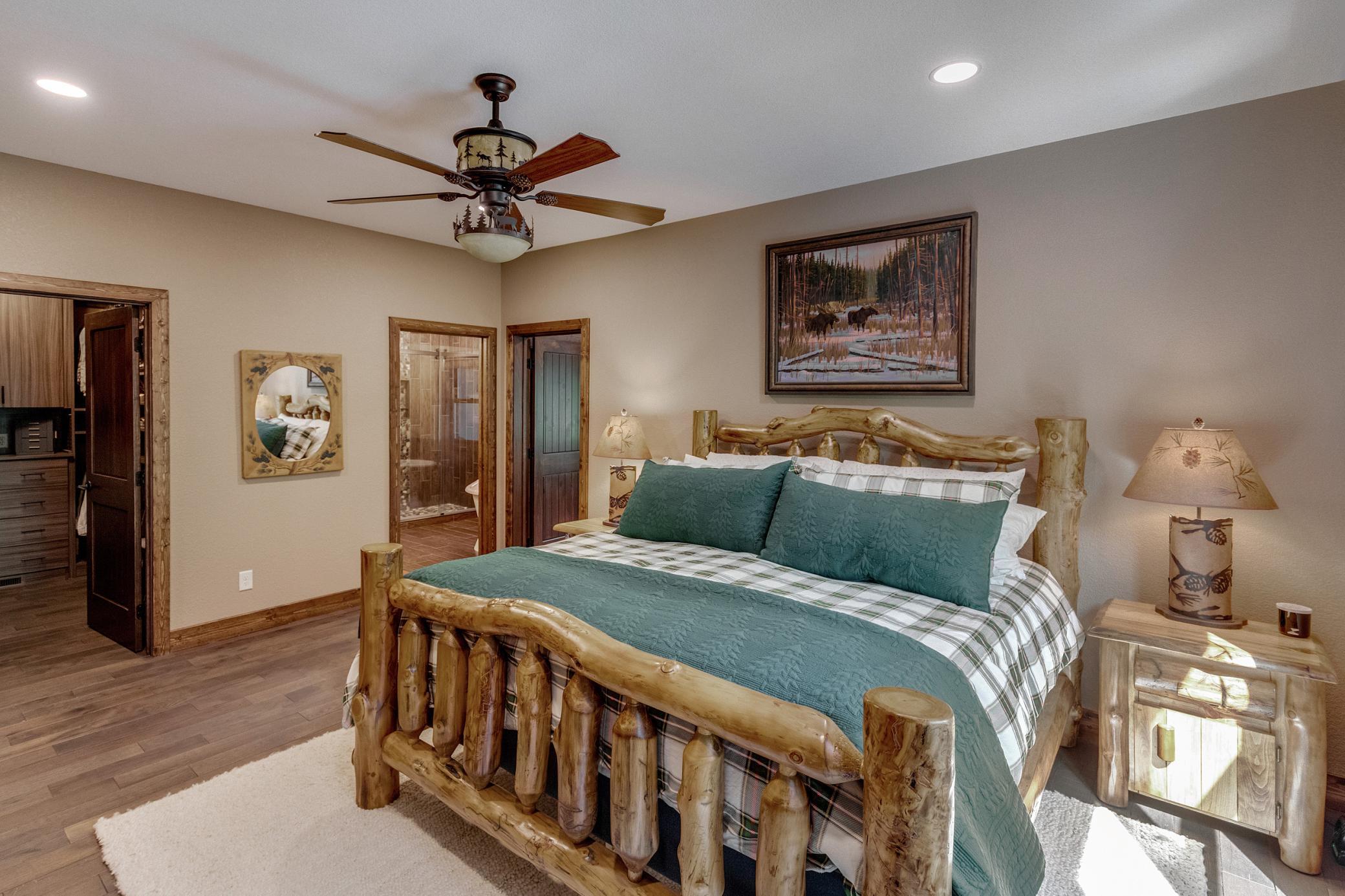 A cozy retreat with warm lighting and thoughtful details that make every night feel restful. His and hers closets