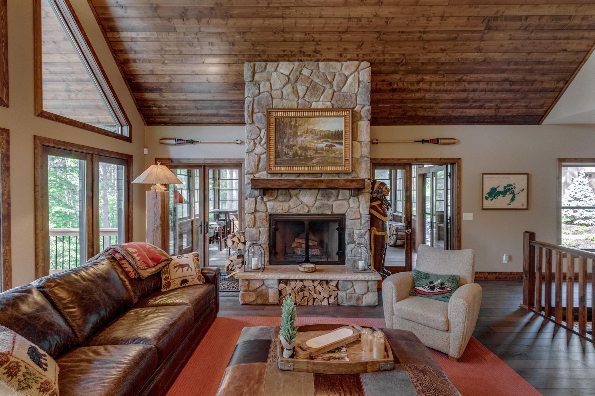 Picture perfect fireside moments await in this living room centerpiece.