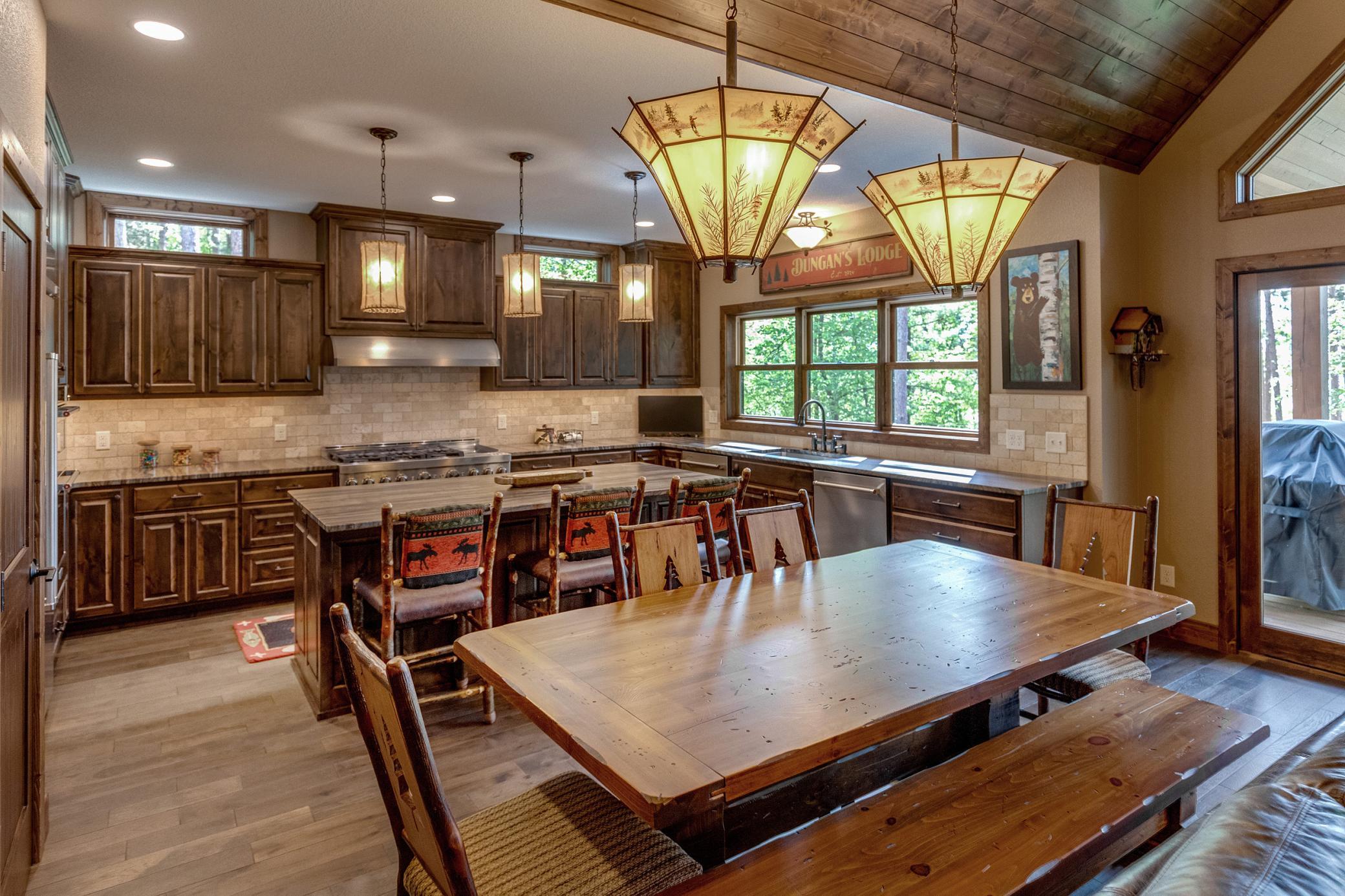 Wash away the day with a serene view of the woods right from your kitchen sink.