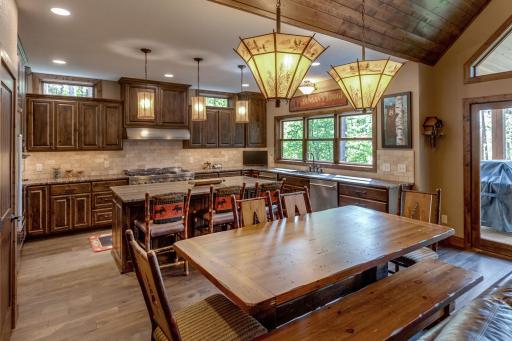Wash away the day with a serene view of the woods right from your kitchen sink.