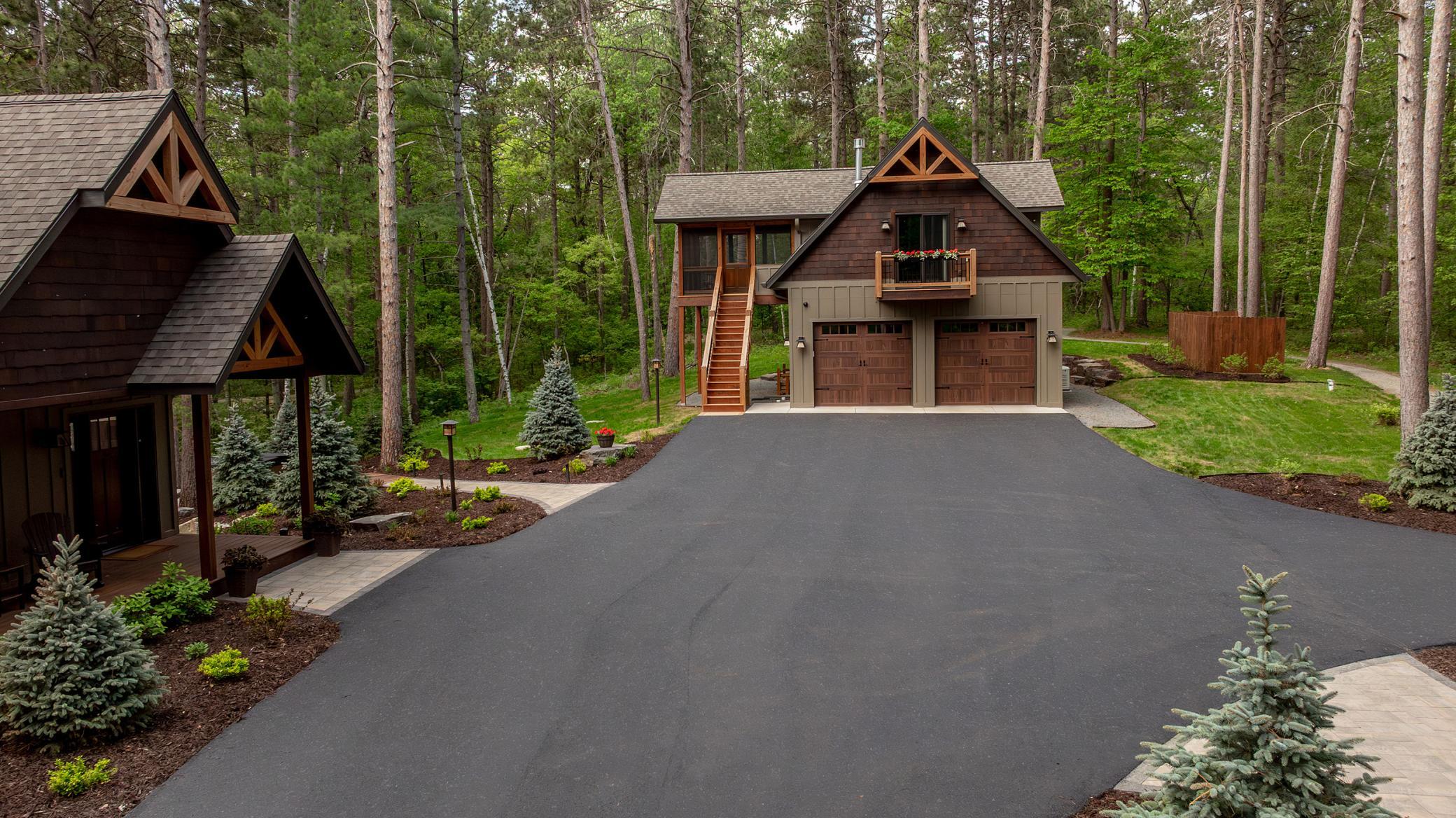 Carriage House and Garage. The carriage house features its own kitchen and gathering space for guests to seek a place of their own within the estate.