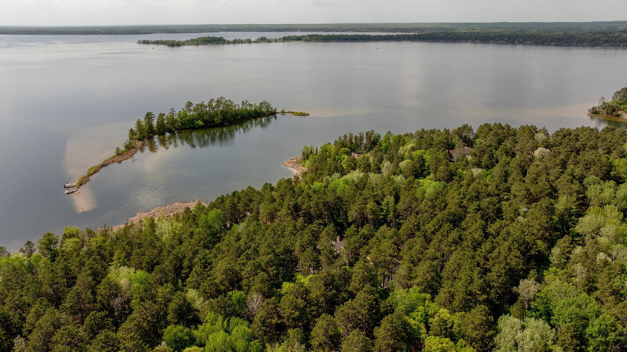 Where tranquility meets beauty: panoramic lake views that make every day feel like a getaway. Little island across the way with a wonderful sandbar