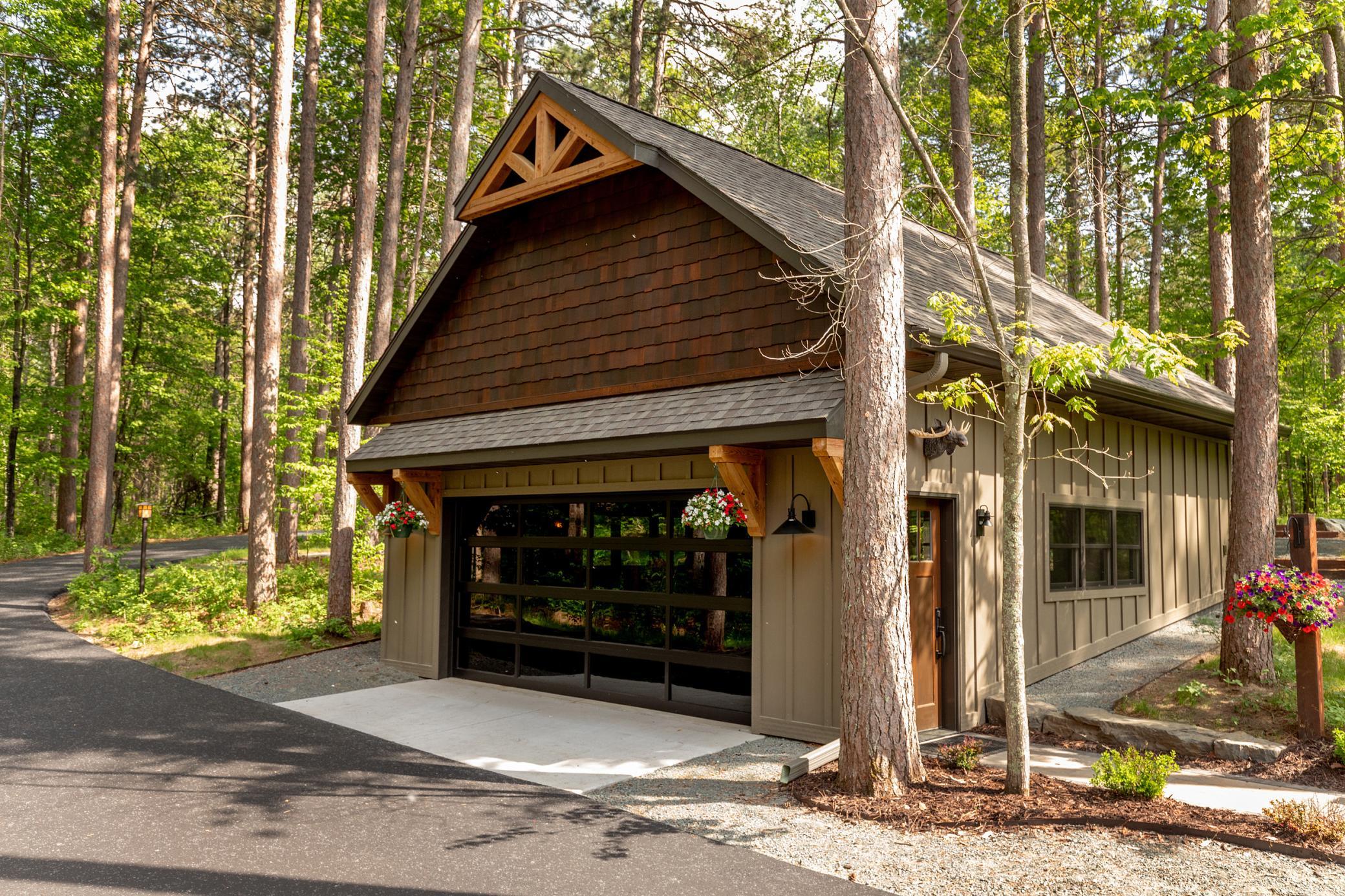 The Moose Lodge is more than a garage- its a destination on its own. Ample space for entertaining or golf simulator. Endless opportunities