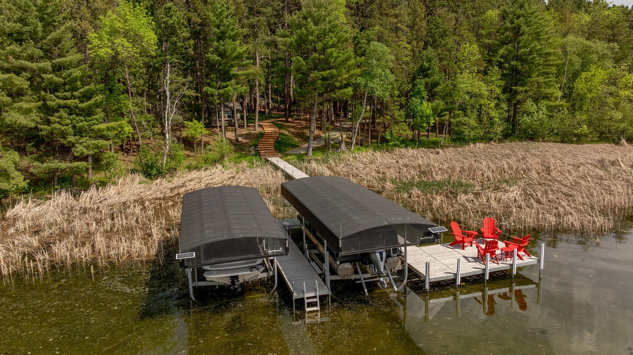 Water lovers rejoice! Private dock access and beautiful lakefront make every moment magical.