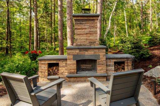 Gather around the outdoor fireplace and enjoy cozy evenings surrounded by the beauy and tranquility of the lake