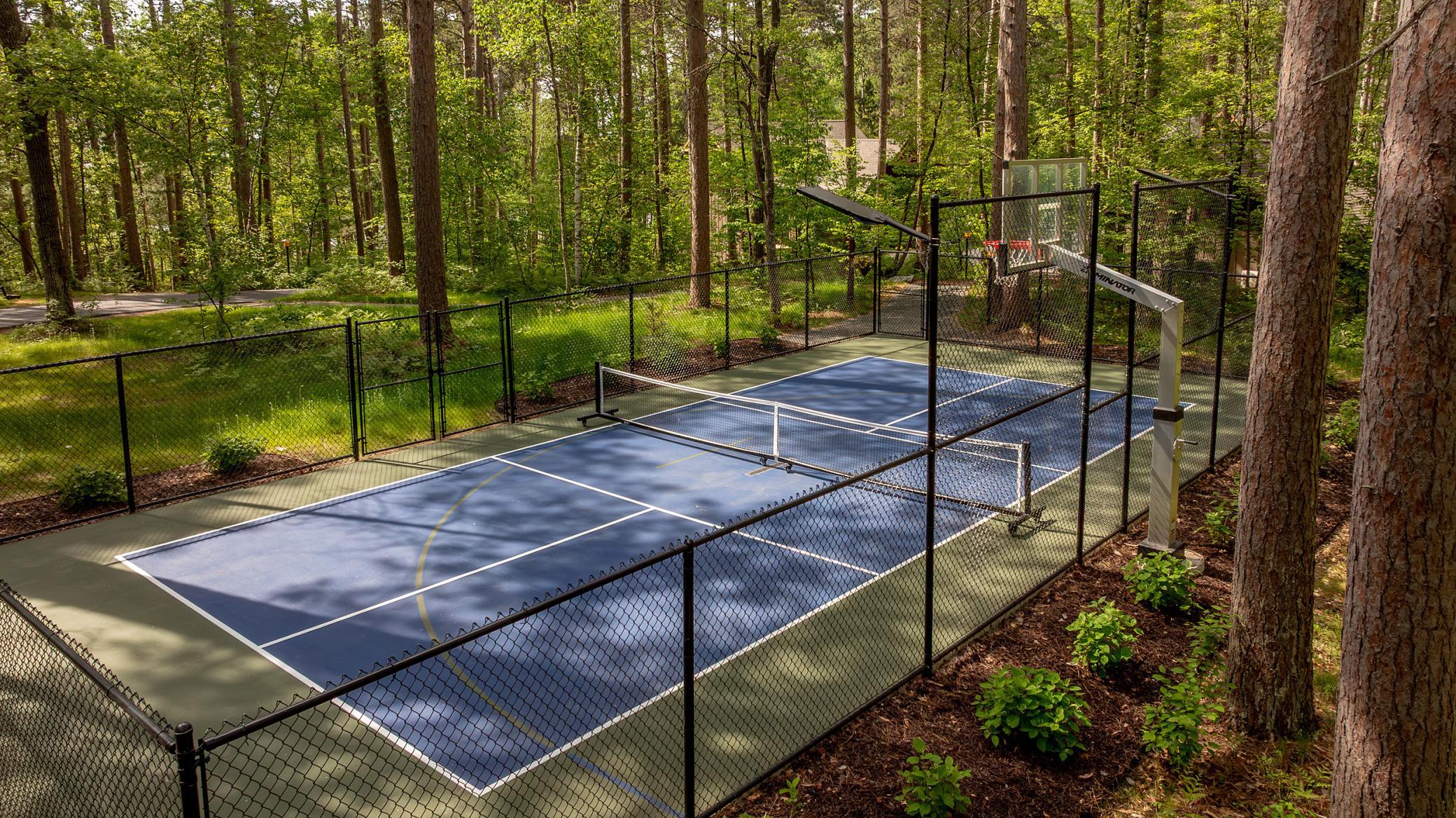 Enjoy an active, resort-inspired lifestyle on the lighted pickleball/tennis court, designed for friendly competition. Permits already in place for future enclosure, the possibilities are endless