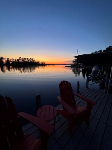 Savor breathtaking sunrise and sunset views right from your private dock—pure lakeside bliss.