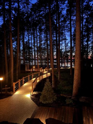 Experience tranquility after dark with beautifully illuminated boardwalk paths.