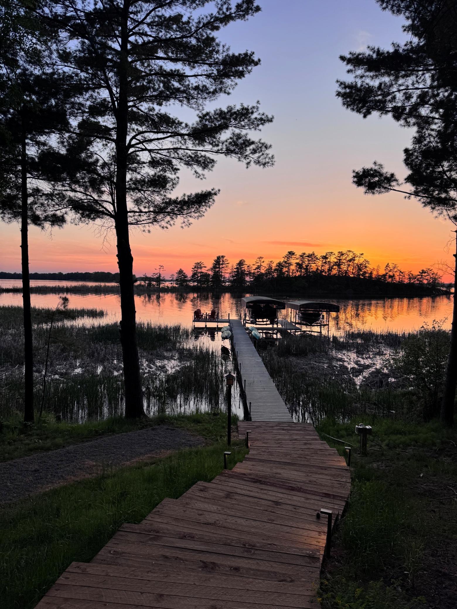 Nature’s daily masterpiece—stunning lakeside sunrises and sunsets from your own backyard.