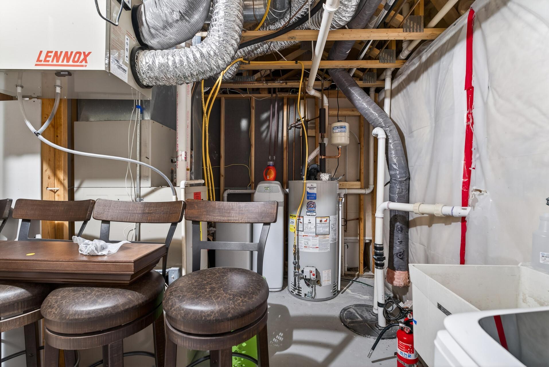 Laundry room/utility/storage room in the basement.