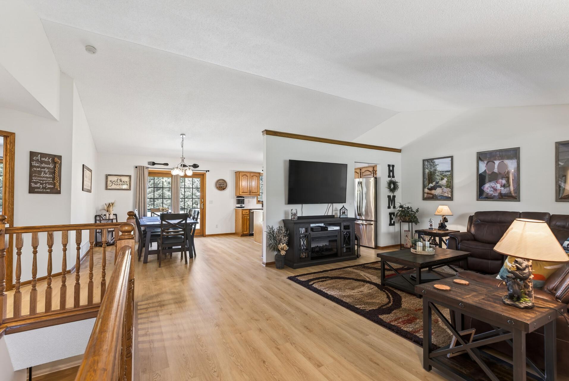 Vaulted ceilings in the living and dining rooms, and in the kitchen.
