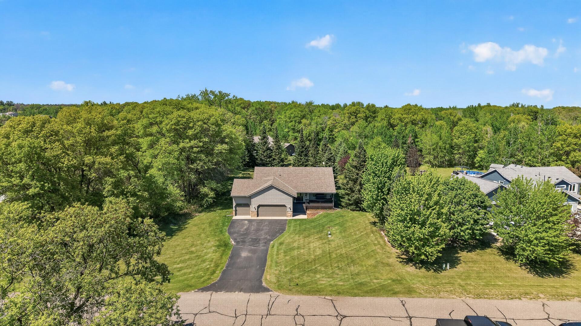 1-acre with a variety of trees.