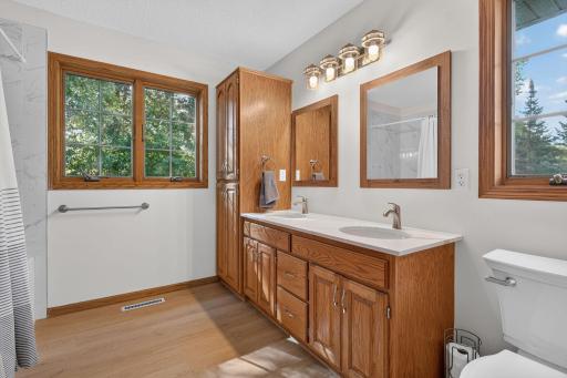 Double vanity with tub/shower.