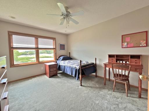 Additional upstairs bedroom w/views of rolling hills and golf course