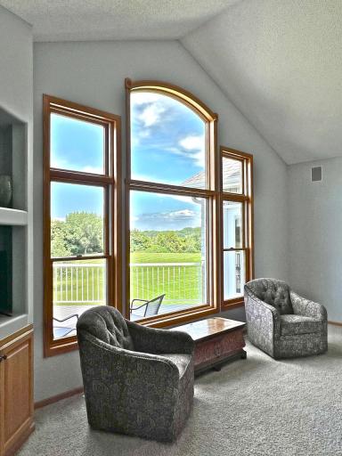 Spectacular views of golf course and rolling hills through oversized great room window
