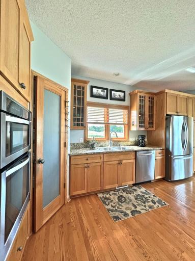 Your dream kitchen awaits with pantry, stainless steel appliances, plentiful cabinetry, and counterspace