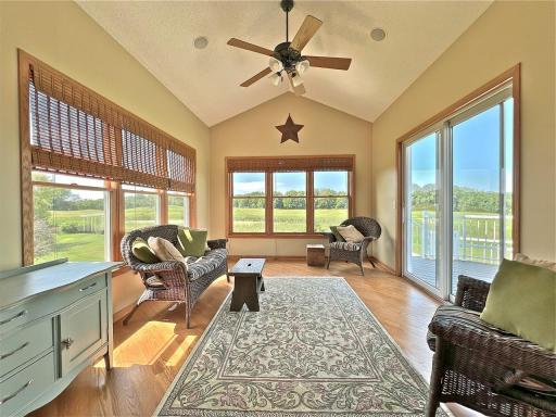Sunroom surrounded w/dramatic views of rolling hills, woods, and golf course