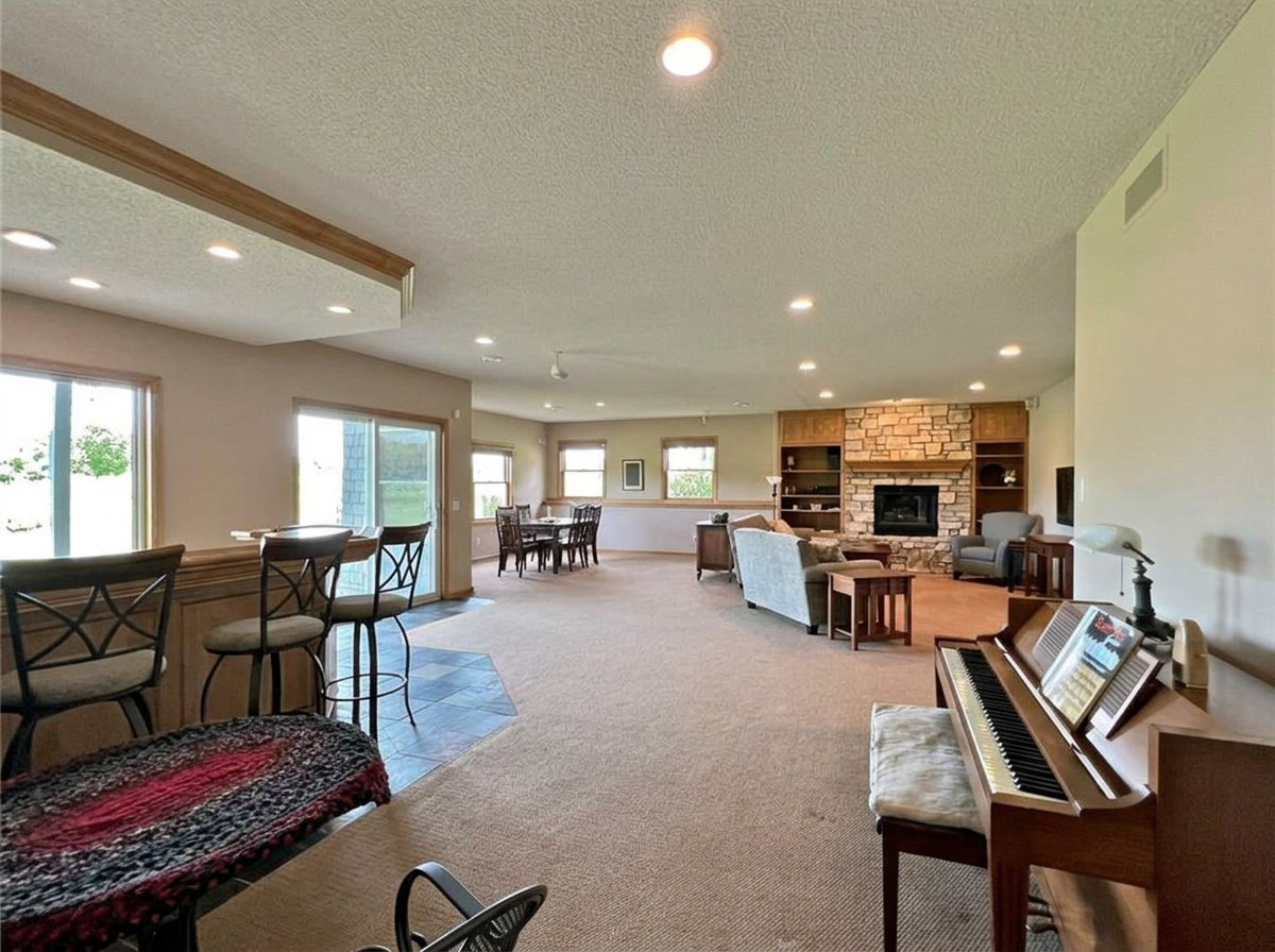 Huge, open walkout lower level w/family room and bar area