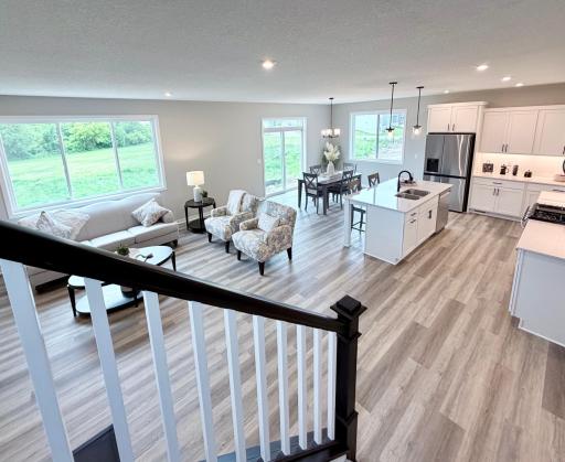 9686 32nd St NE- Main level features an abundance for windows offering natural light.