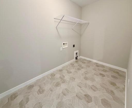 9686 32nd St NE- Spacious Upper Level Laundry Room conveniently located near the bedrooms.
