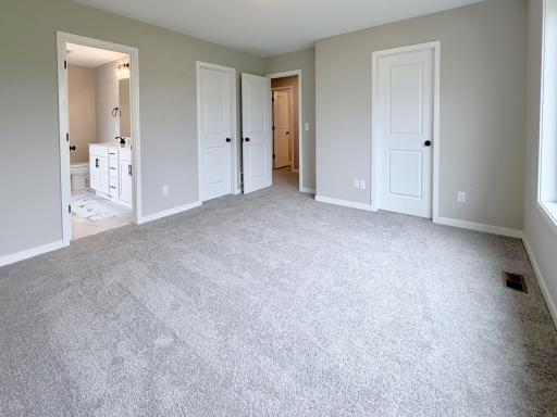 9686 32nd St NE- Primary Suite offers Two Walk-in Closets