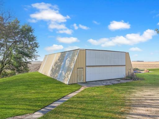 70X50 Shed with Bi-fold door, concrete floors, and an insulated room