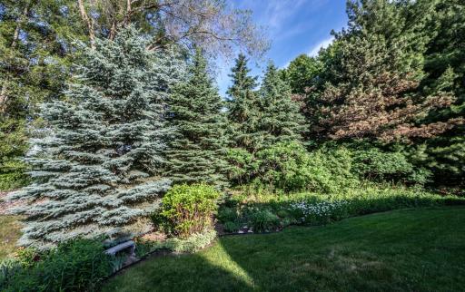 You will absolutely love the perennial gardens surrounding this home. So well cared for and designed by the owner.