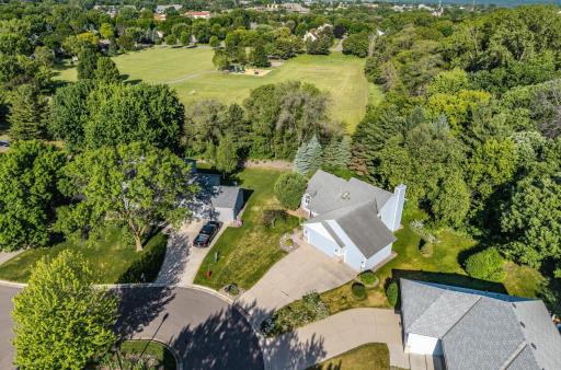 Overview of the home and you can appreciate the privacy of the yard and the park beyond it. Very, very nice neighborhood.