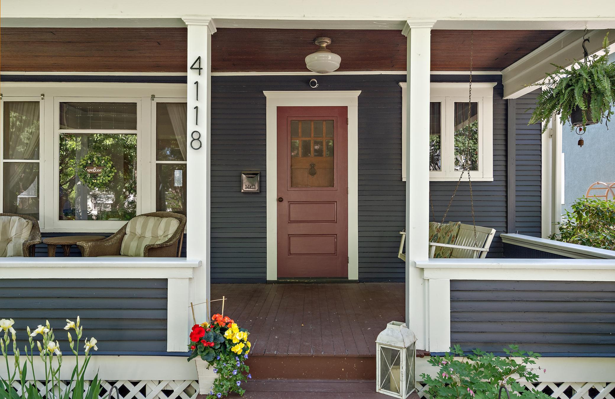 Inviting porch ideal for relaxing and neighborhood connection