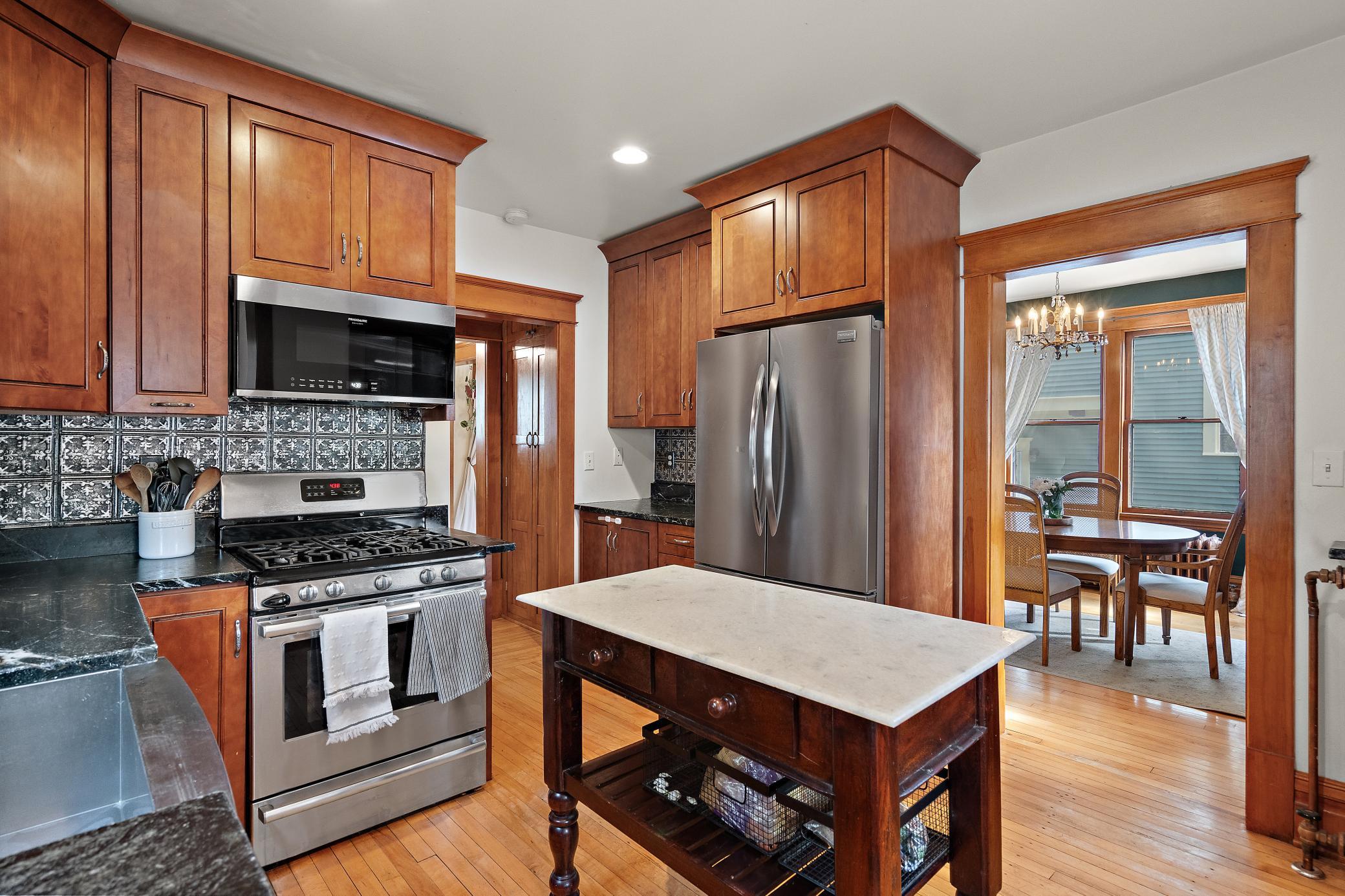 The updated kitchen matches the classic look of the home