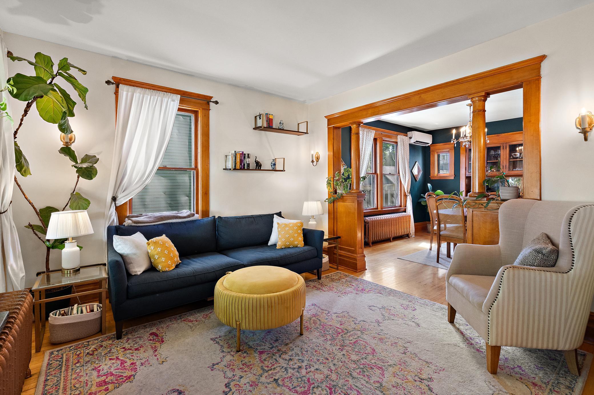 Character-rich living room flowing into the formal dining room