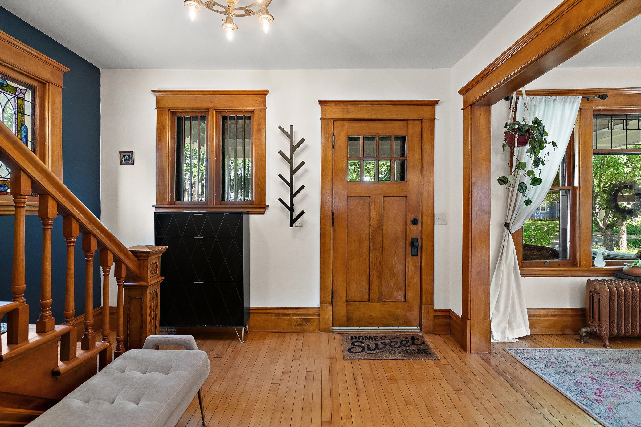 Warm hardwood floors and beautifully preserved wood details throughout the home