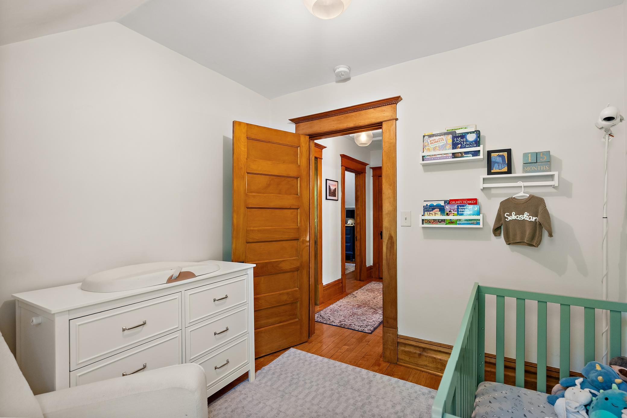 This bedroom is currently used as a nursery, could also serve as an office.