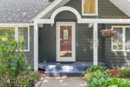 Fresh paint on front of home and porch with a new roof installed in 2024