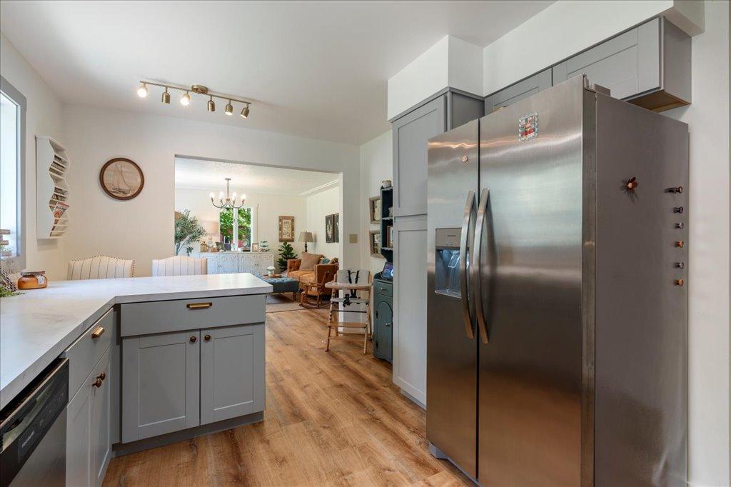 Stainless Steel Appliances / LVP Throughout Main Level