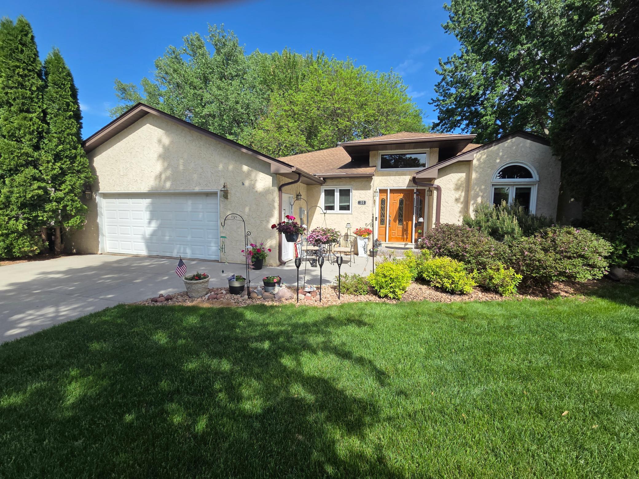 Mature Trees Gardens Surround This Fantastic Corner Lot