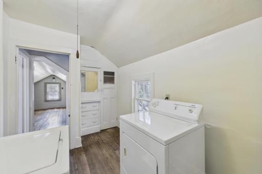 Dedicated upper-level laundry room providing added convenience near the bedrooms.