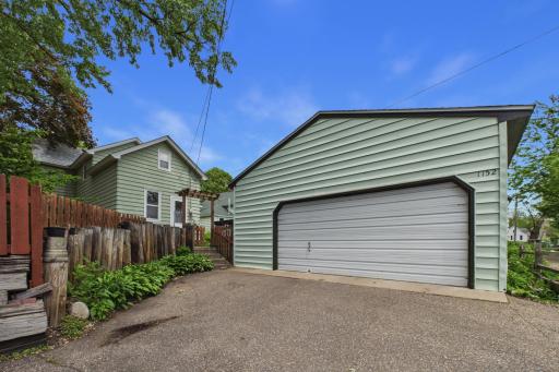 Large detached garage with alley access offering extra storage, workspace, and off-street parking.