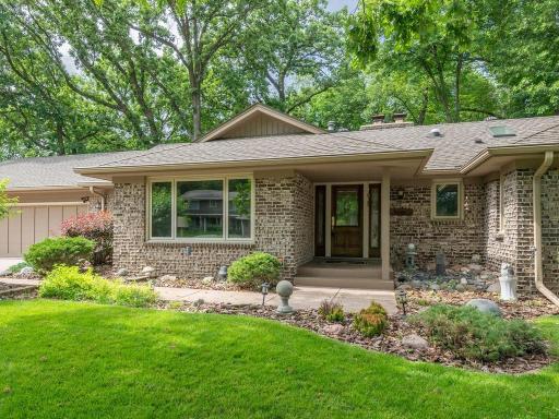 3 Bedrooms on main level. 3 baths, 3 car attached garage. Inviting front entrance... brick with weeping mortar.