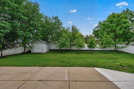 Private yard fully fenced and shed