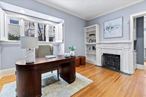 An elegant main-floor office featuring refined finishes, abundant natural light, and a quiet, sophisticated atmosphere