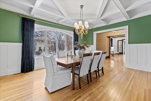 Light-filled dining room showcasing elegant woodwork and meticulous attention to detail