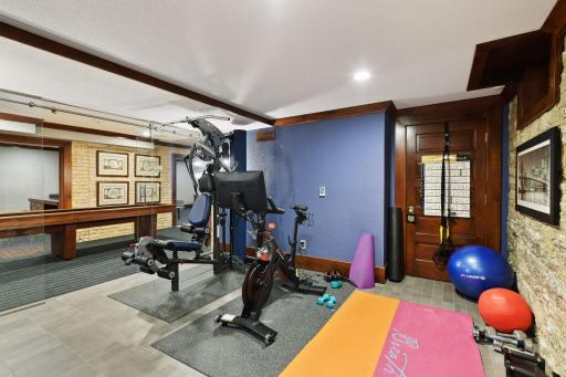 Versatile studio perfect for a home gym, yoga studio, or Peloton workouts
