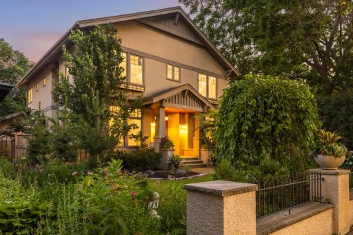Beautiful landscaping throughout the private fenced lot!