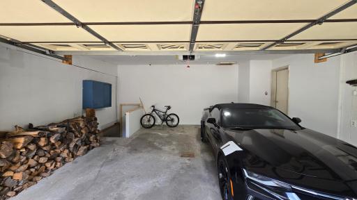 2-stall garage with stairs to the lower level
