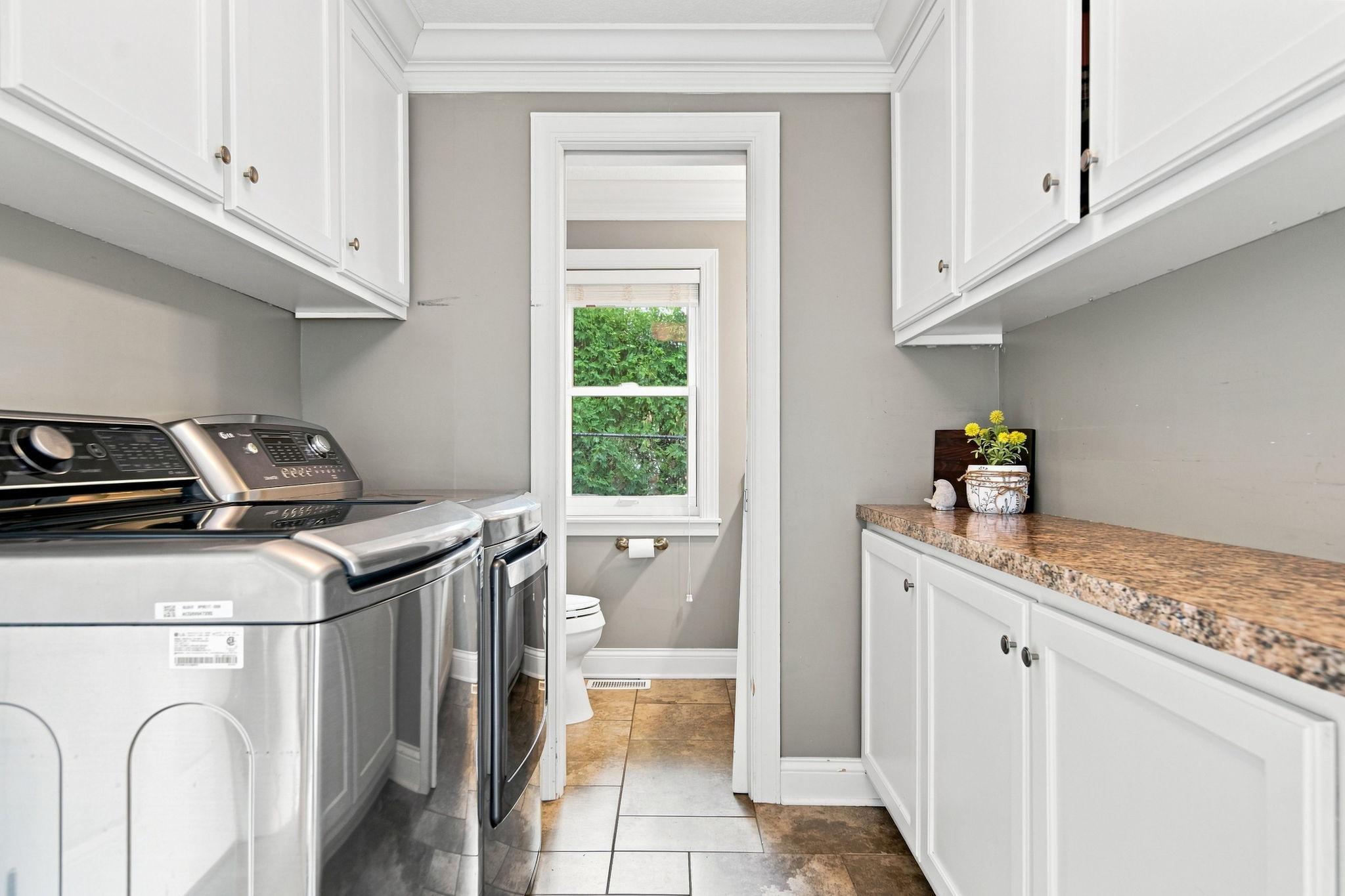 Main level laundry room with extra storage