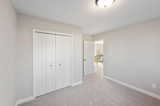 Bedroom - photo of a model home of the same floorplan. Selections may be different.